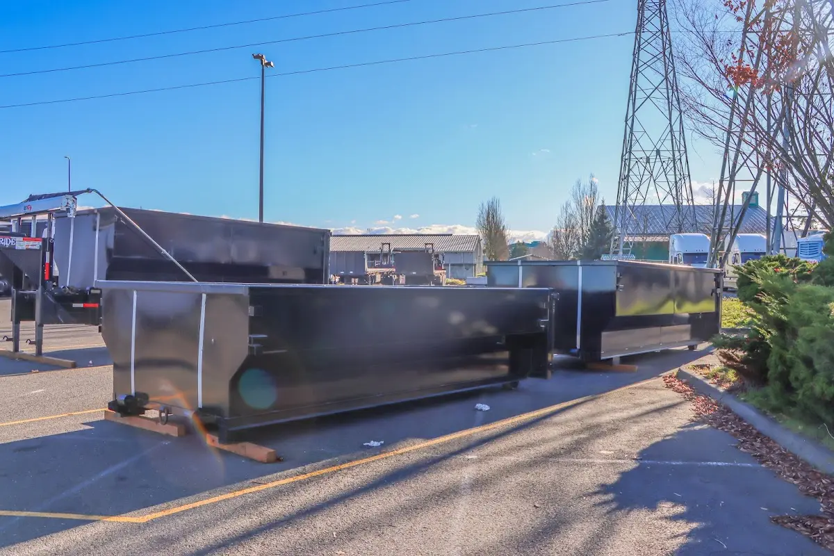 Roll-off dumpster ready for waste disposal at job site for Yard Waste Dumpster Rental in Ellisville